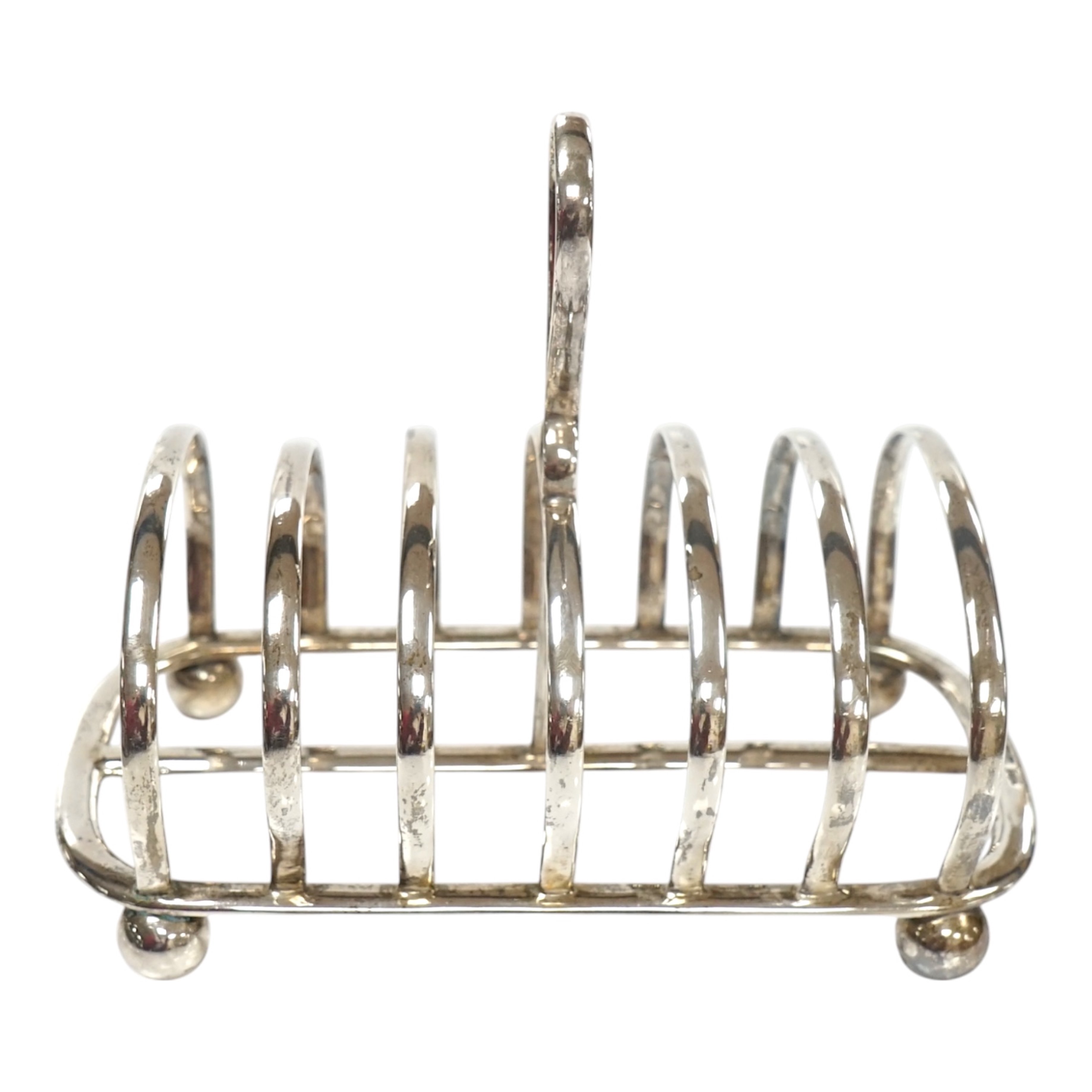 A George V silver seven bar toast rack, by Mappin & Webb, Sheffield, 1913, length 15cm, 7.3oz. Condition - fair to good